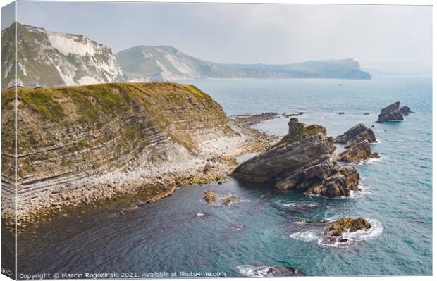 Sea stacks at Mupe Bay near Lulworth in Dorset England United Kingdom UK Canvas Print by Marcin Rogozinski
