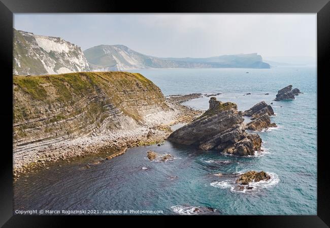 Sea stacks at Mupe Bay near Lulworth in Dorset England United Kingdom UK Framed Print by Marcin Rogozinski