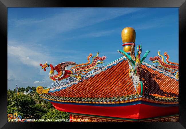 Chinese dragon statue on a roof of a temple Framed Print by Wilfried Strang