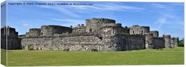 Majestic Ruins of Beaumaris Castle Canvas Print by Mark Chesters
