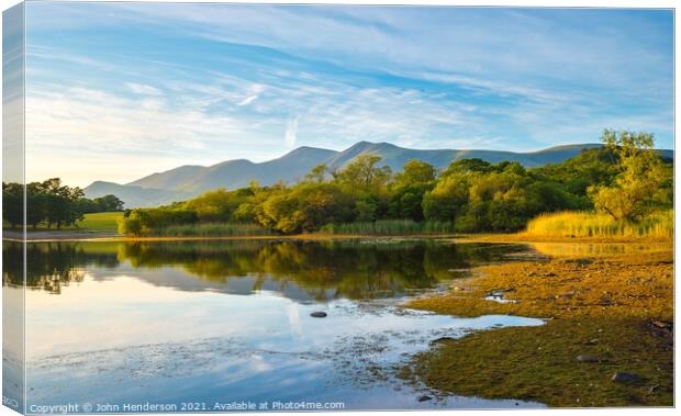 Derwentwater summer reflections Canvas Print by John Henderson