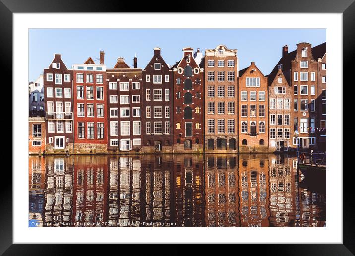 Traditional Dutch buildings at Damrak in Amsterdam Netherlands Framed Mounted Print by Marcin Rogozinski