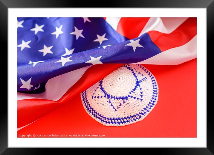 Jewish kipa under an American flag, isolated on red background Framed Mounted Print by Joaquin Corbalan