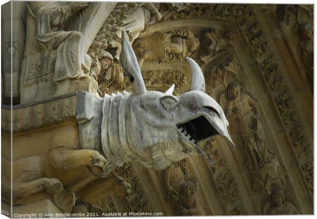 Rino gargoyle at Riems Notre Dame Canvas Print by Ann Biddlecombe