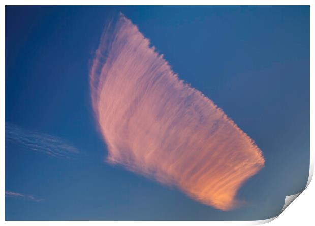 Cloud formation against a blue sky Print by Rory Hailes