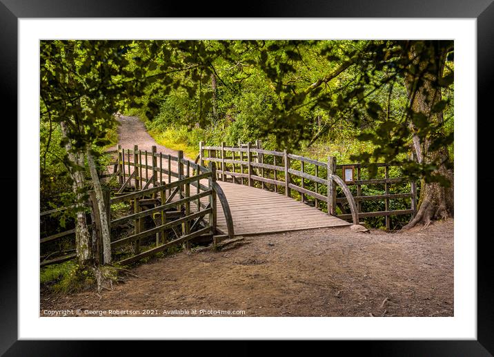 Pooh Sticks Bridge located in the One Hundred Acre woods  Framed Mounted Print by George Robertson