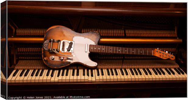 Vintage Fender Telecaster electric guitar on piano Canvas Print by Helen Jones