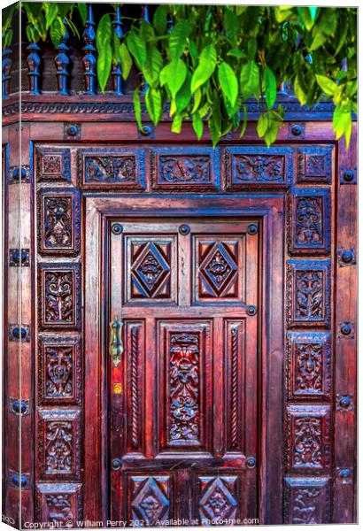 Colorful Wooden Door Santa Cruz Garden District Seville Spain Canvas Print by William Perry