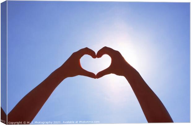 Girls heart hands on the sky  Canvas Print by M. J. Photography