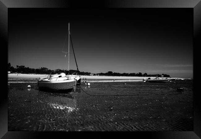 boats laying on the beach in blackwhite Framed Print by youri Mahieu