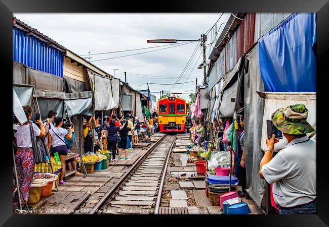 The Maeklong Railway Market near Bangkok in Thailand Asia Framed Print by Wilfried Strang