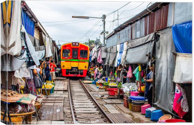 The Maeklong Railway Market near Bangkok in Thailand Asia Canvas Print by Wilfried Strang