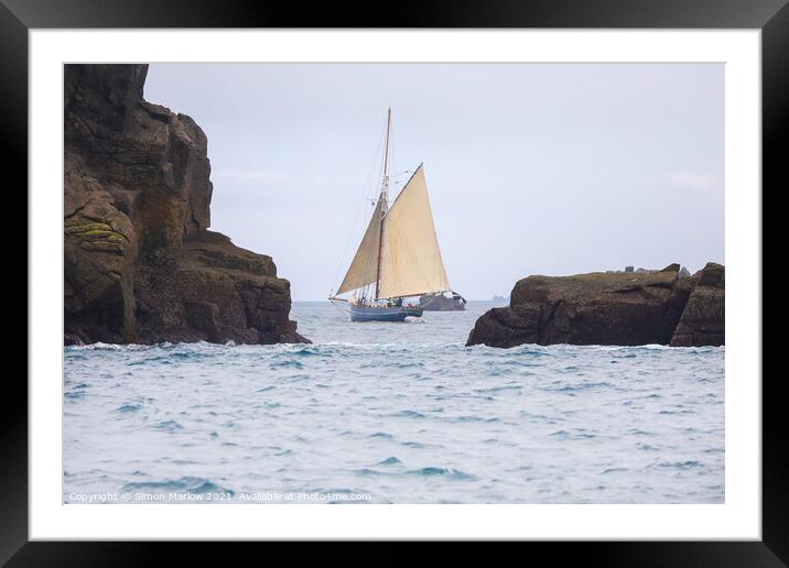 Yacht sailing between rocks in the Isles of Scilly Framed Mounted Print by Simon Marlow