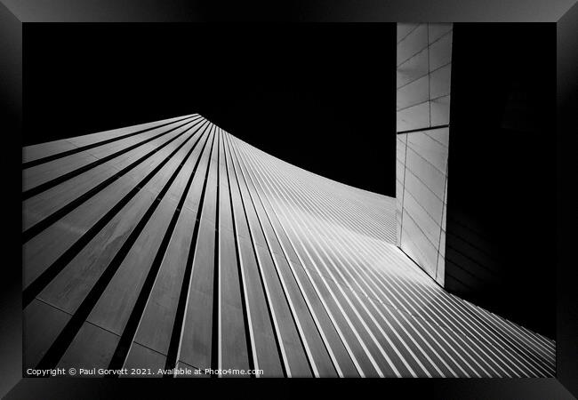 modern city building looking up to clear sky black and white Framed Print by Paul Gorvett