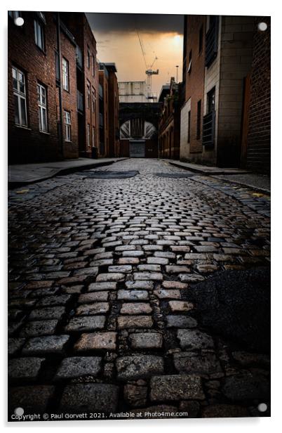 wet cobbled street in Manchester city center UK Acrylic by Paul Gorvett