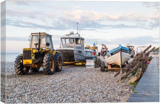 Tractors and fishing boats on Cromer beach Canvas Print by Jason Wells