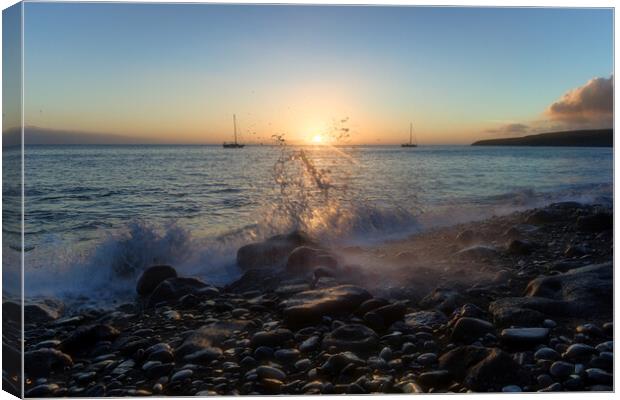 Sunset on a Rocky Beach Canvas Print by Ashley Wootton