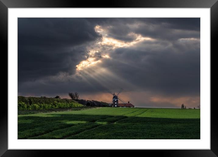 Sun rays over Weybourne mill  Framed Mounted Print by Gary Pearson