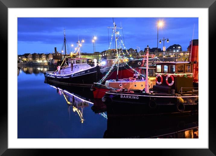 Barges with xmas lights at chatham marina Framed Mounted Print by stuart bingham