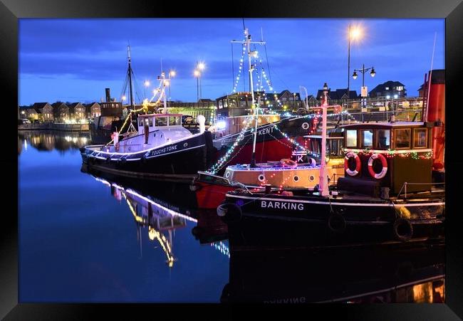 Barges with xmas lights at chatham marina Framed Print by stuart bingham