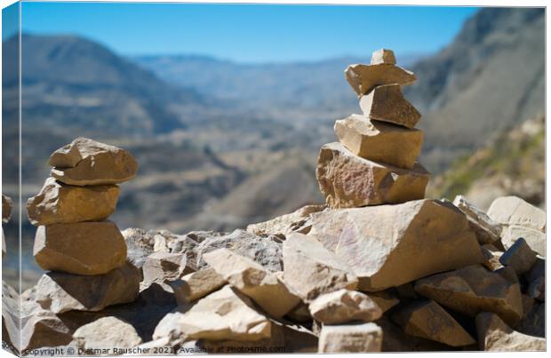 Piled up Stones in Colca Valley, Peru Canvas Print by Dietmar Rauscher