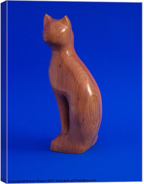 Carved wooden Cat on Blue Canvas Print by Robert Gipson