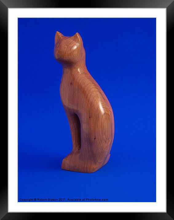 Carved wooden Cat on Blue Framed Mounted Print by Robert Gipson
