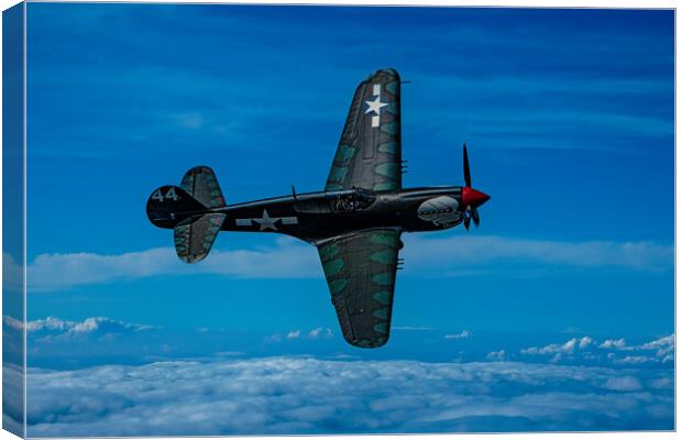 Curtis P40 Kittyhawk High Above The Clouds  Canvas Print by Chris Lord