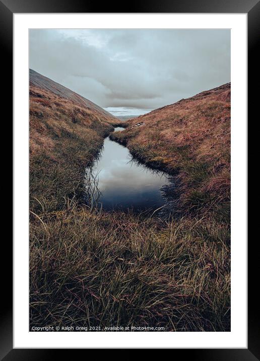 Reflect at 3000 feet Framed Mounted Print by Ralph Greig