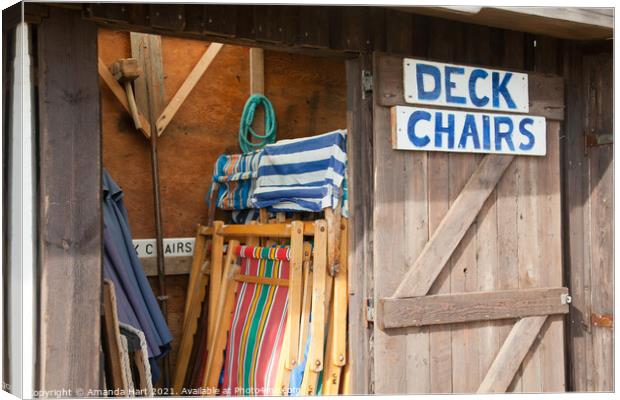 Deck chairs - seaside still life Canvas Print by Amanda Hart