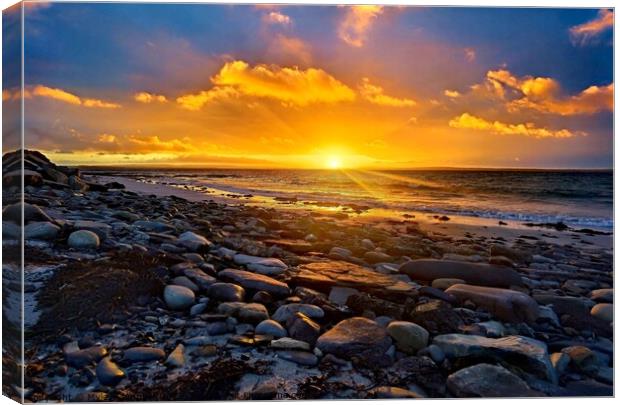 Sunset on the rocky beach Canvas Print by Myles Campbell