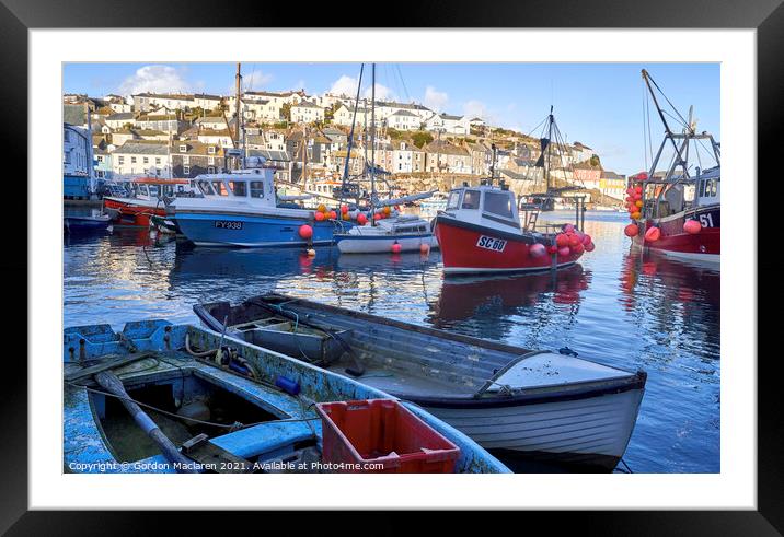 Fishing boats and sailing boats moored in Mevagissey Harbour, Cornwall.  Framed Mounted Print by Gordon Maclaren