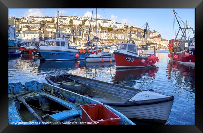 Fishing boats and sailing boats moored in Mevagissey Harbour, Cornwall.  Framed Print by Gordon Maclaren