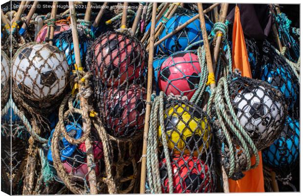 Footballs used as fishing floats Canvas Print by Steve Hughes