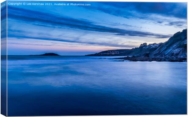 Sun setting over the sea, Looe Island and West Looe. Shot taken from Millendreath. Canvas Print by Lee Kershaw