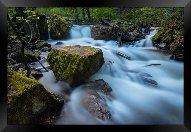 Long exposure image of a wild forest river. Framed Print by Andrea Obzerova