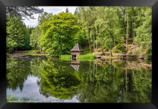 Boathouse on Loch Dunmore in Faskally Forest Framed Print by Angus McComiskey