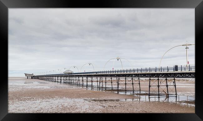 Southport Pier at low tide Framed Print by Jason Wells