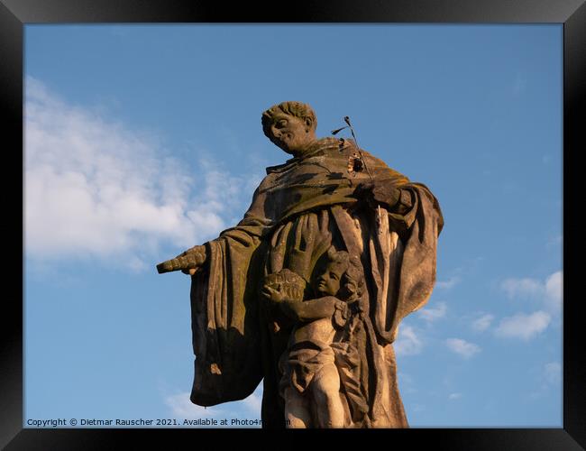 Statue of Saint Nicholas of Tolentino on Charles Bridge Framed Print by Dietmar Rauscher