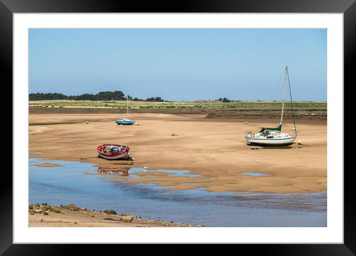 Fishing boats beached at Wells Framed Mounted Print by Jason Wells