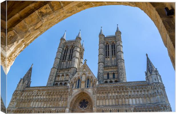 Looking through an archway at Lincoln cathedral Canvas Print by Jason Wells