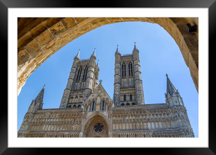 Looking through an archway at Lincoln cathedral Framed Mounted Print by Jason Wells