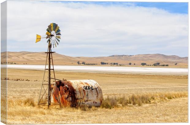 Wind wheel and water tank - South Australia Canvas Print by Laszlo Konya