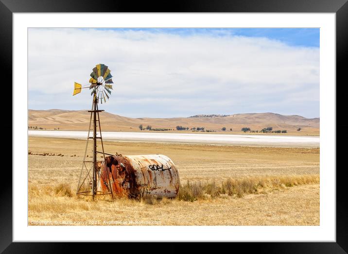Wind wheel and water tank - South Australia Framed Mounted Print by Laszlo Konya