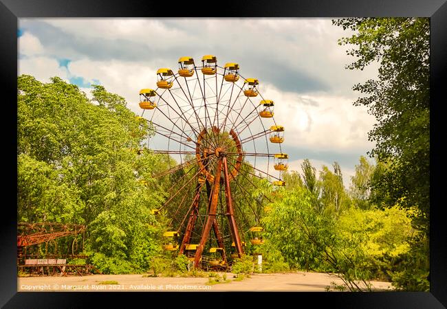 Eerie Abandoned Ferris Wheel Framed Print by Margaret Ryan
