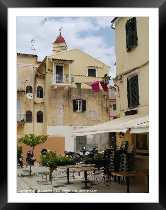 Square in Corfu town  Framed Mounted Print by Les Schofield
