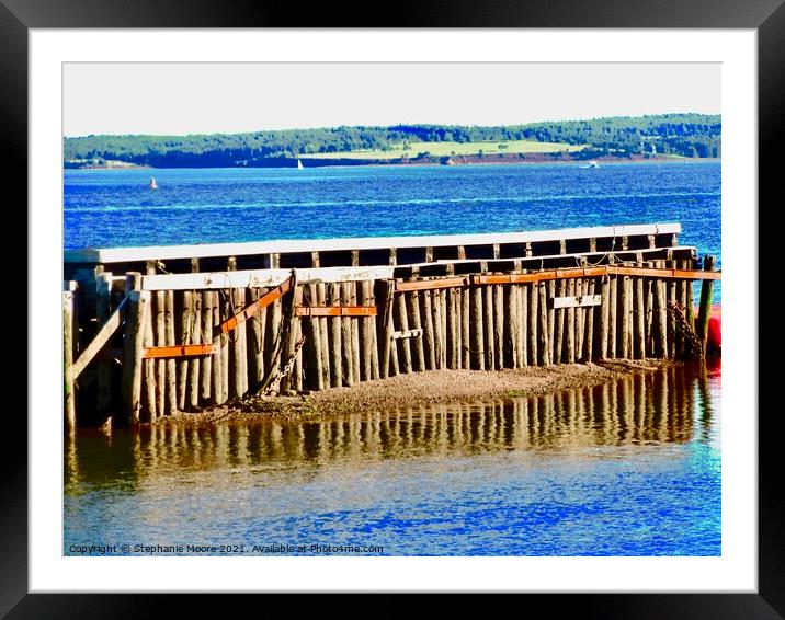 Pilings under a dock Framed Mounted Print by Stephanie Moore
