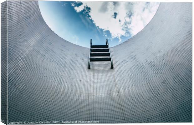 Sparse staircase of an empty pool, seen from below, minimalist t Canvas Print by Joaquin Corbalan