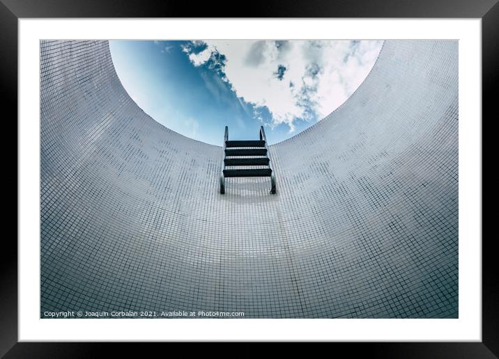 Sparse staircase of an empty pool, seen from below, minimalist t Framed Mounted Print by Joaquin Corbalan