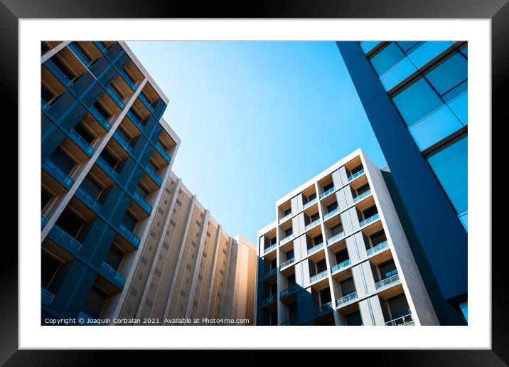Residential buildings in a quiet neighborhood with high purchasi Framed Mounted Print by Joaquin Corbalan